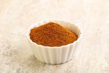 Dry Paprika powder in the bowl
