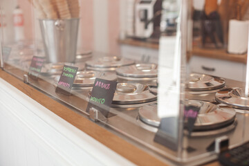 Process of making ice cream. Professional ice cream dessert making in cafeteria. Ice cream equipment.