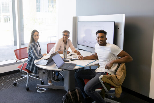 Portrait Happy Mentor And College Students In Library Study Room