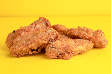 Chicken wings, chicken wings on yellow background, bright background