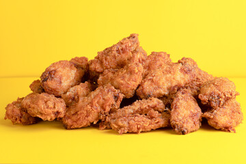 Chicken wings, chicken wings on yellow background, bright background