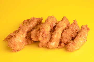 Chicken strips, chicken strips on yellow background, bright background