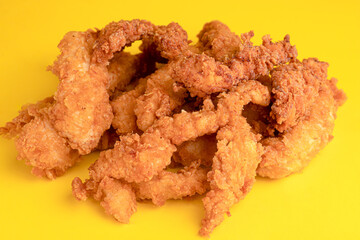 Chicken strips, chicken strips on yellow background, bright background