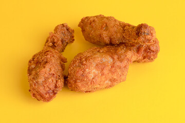 Chicken legs, chicken legs on a yellow background, bright background