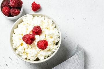 Breakfast bowl, cottage cheese with berries. Top view, flat lay, copy space.