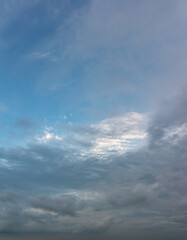 Fantastic clouds against blue sky, panorama