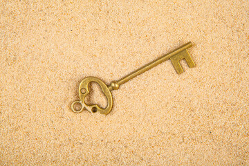 image of key sand background