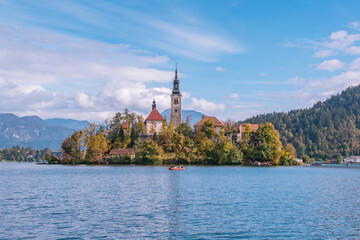 Lake Bled with the church on the island and castle on the hill in autumn time.