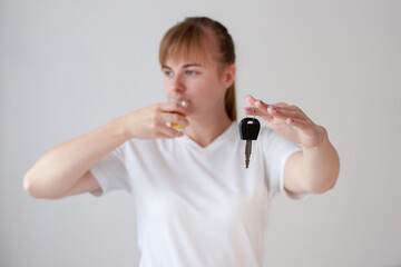 woman with alcohol gives car keys