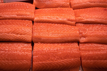 Several fresh salmon fillets. High social class sea food.