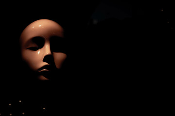 head of a mannequin isolated illuminated by the sun.