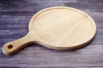 wooden chopping board on table top down 