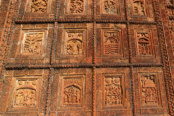 Famous terracotta (fired clay of a brownish-red colour, used as ornamental building material) motif artworks at Madanmohan Temple, Bishnupur, West Bengal, India. UNESCO heritage site of India.