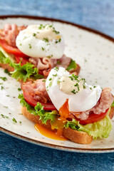 poached eggs on the toasts