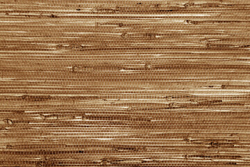 close up of the brown bamboo grass wicker wall background
