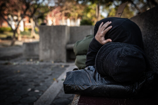 Asian Man Is Homeless At The Side Road,A Stranger Has To Live On The Road Alone Because He Has No Family.