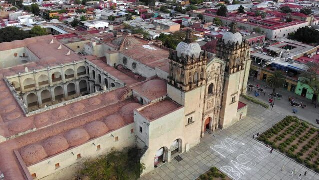 Aerial Shot of Cathedral Templo de Santo Domingo de Guzman is a Baroque ecclesiastical building at sunset in Oaxaca, Mex
