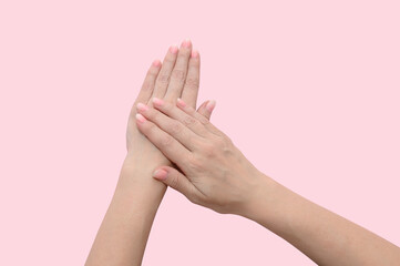 Women's hands with a beautiful manicure. Treatment and spa care for the skin of hands and nails.