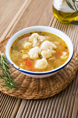 Vegetable soup with potato, carrot, and cauliflower. Homemade food