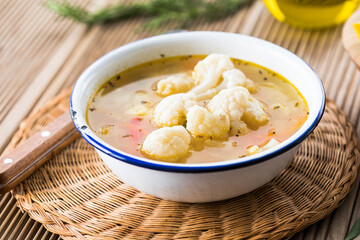 Vegetable soup with potato, carrot, and cauliflower. Homemade food