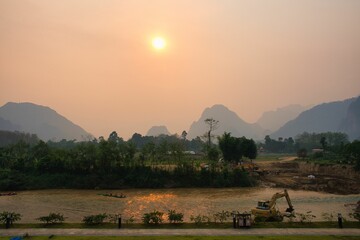 Fototapeta na wymiar Surreal landscape by the Song river at Vang Vieng, Laos. High quality photo