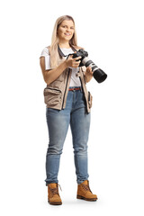 Full length shot of a young female journalist, photo reporter with a camera