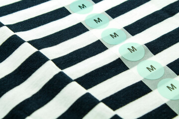 T-Shirt and label size M close up
