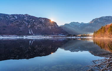 Fototapeta na wymiar Beautiful reflections at lake Bohinj in Julian Alps