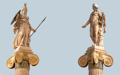 Athena and Apollo marble statues on Ionic style columns. Athens, Greece.