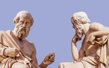 Plato and Socrates, the ancient Greek philosophers, with thoughtful expressions. Marble statues,...