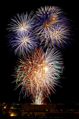 Explosion of bright colors of fireworks on the night of celebration.