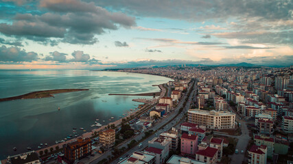 Taken with a drone from the Atakum district of Samsun; View of the city, sunset, Kurupelit Yacht...