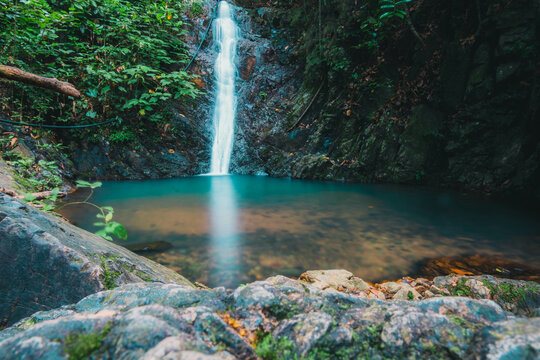 Long exposure image of beautiful waterfall in the jungle at Pulau Tinggi, Mersing, Johor, Malaysi
