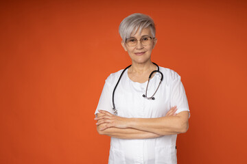 portrait of an adult nurse in glasses in a white coat