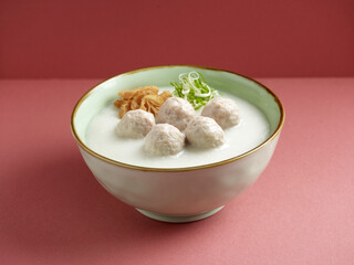 Handmade Meatball Congee served in a dish isolated on mat side view on grey background