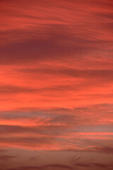 Sky light after sunset. orange background, clouds
