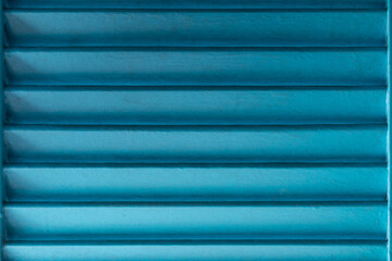 Obraz premium Old blue painted wooden window shutter