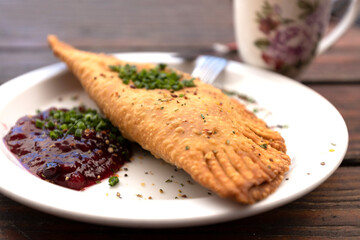 appetizing flatbread with lingonberry jam