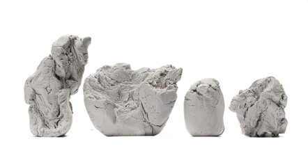 Obraz premium Grey modelling clay blocks, pieces isolated on white 