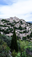 Fototapeta premium Beautiful city of Gordes perched atop a hillside in the Provence countryside of France