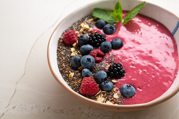Close up of acai smoothie bowl with chia seeds vegan food