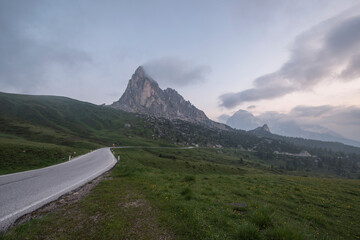 Beautiful day in the Italian Dolomites mountains with lakes and pastures. 
