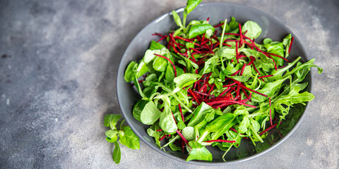 salad beet green leaves mix beetroot, mache leaves, cress fresh healthy meal food snack diet on the...