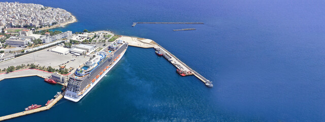 Aerial drone ultra wide panoramic photo of busy port of Piraeus, the largest in Greece and one of...