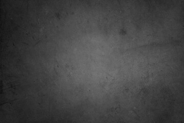 Obraz na płótnie Canvas Close-up of abstract grey concrete wall texture background. Dark edges 