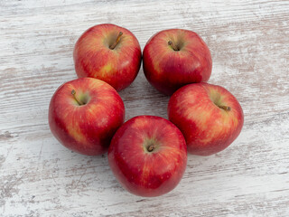Harvest of apples. Ripe juicy apples lie on the table