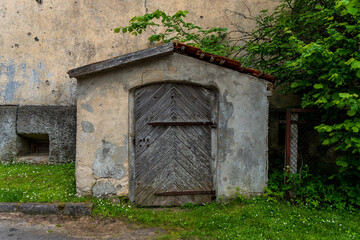Fototapeta na wymiar An old cellar with wooden doors.
