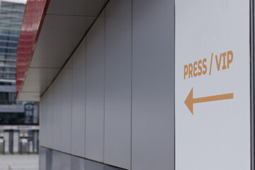  An inscription on the wall of the press and a VIP with an arrow pointing to the stadium