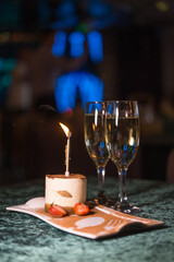 dessert and champagne on the table in the restauran