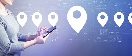 Map pin concept with business woman using a tablet computer